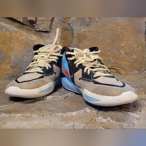 Nike Kyrie Infinity (GS) in the "Baltic Blue/Crimson" colorway.